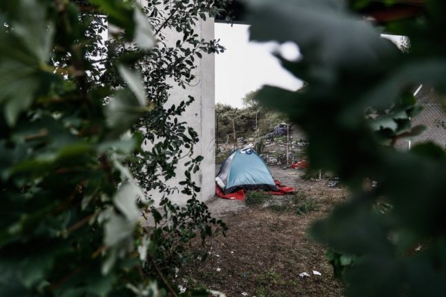 French police clear Channel migrant camps after violence leaves one dead