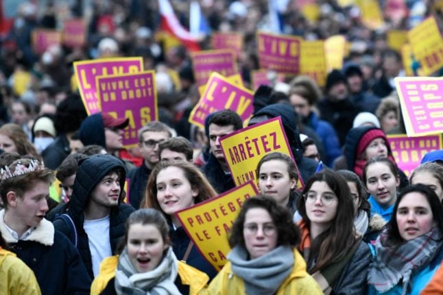 Pro-life activists in Paris, France. Anti-abortion activists are pushing for tighter reproductive health rules in Switzerland via a referendum. Photo: STEPHANE DE SAKUTIN / AFP