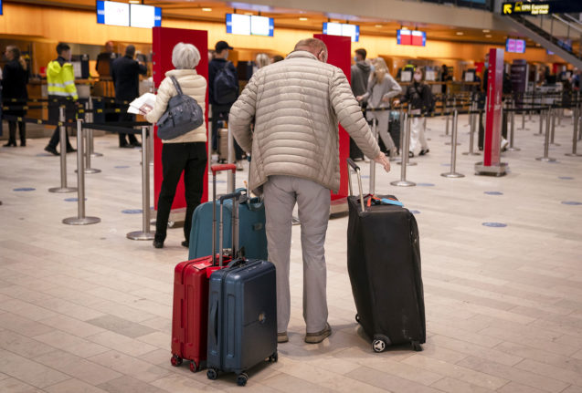 Passengers and baggage at Copenhagen Airport
