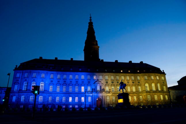 Denmark's Christiansborg parliament lit in the Ukrainian colours
