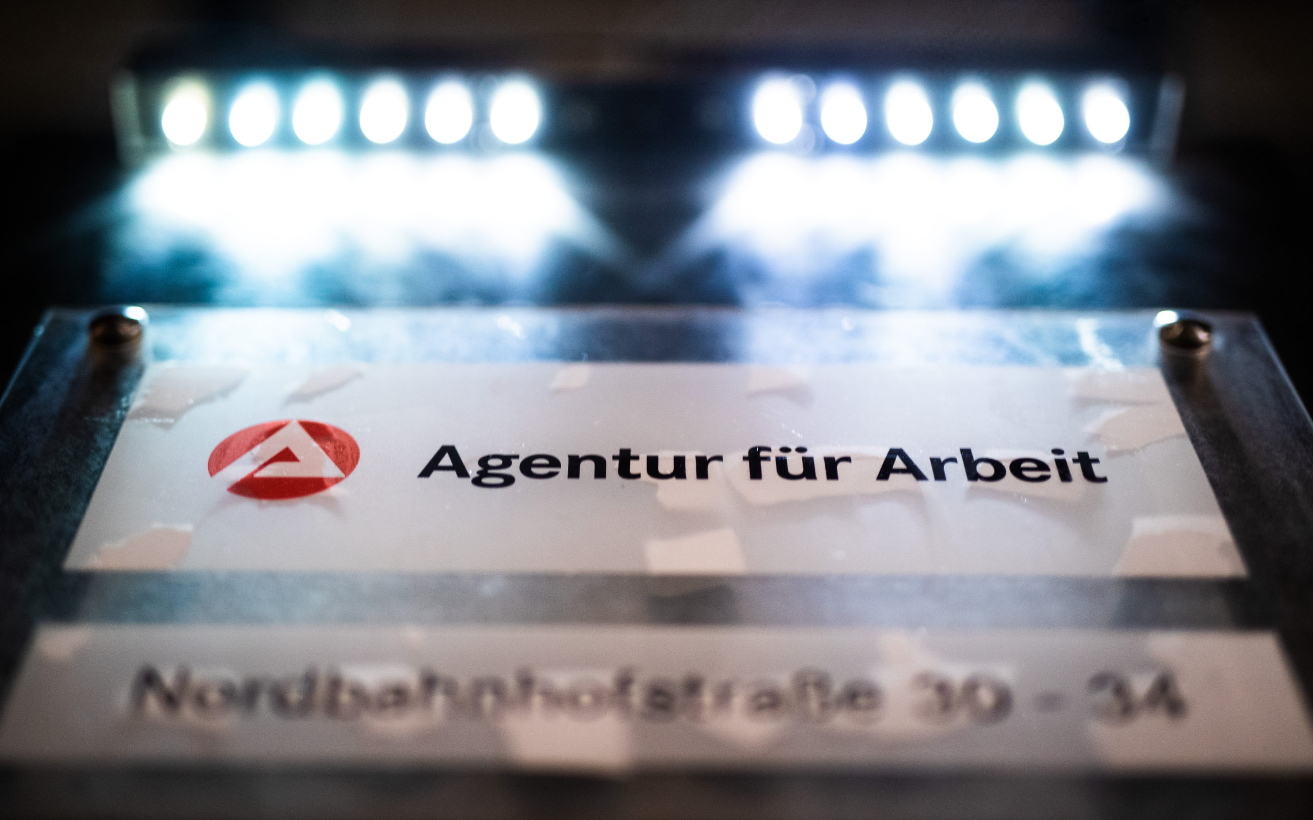 A sign at the entrance of the Agentur für Arbeit or Job Centre in Stuttgart.