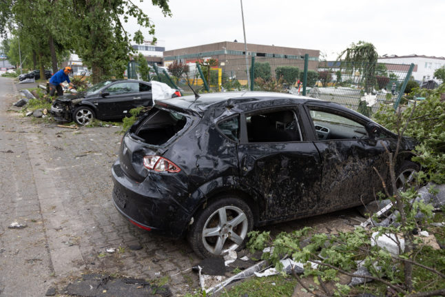 View of destroyed cars on a street. A tornado caused massive damage in Paderborn and Lippstadt on Friday 20th May 2022.