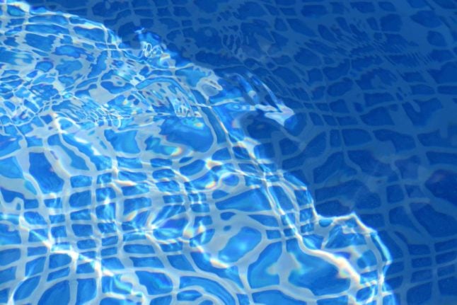 A close up of a swimming pool. Photo by Ann on Unsplash