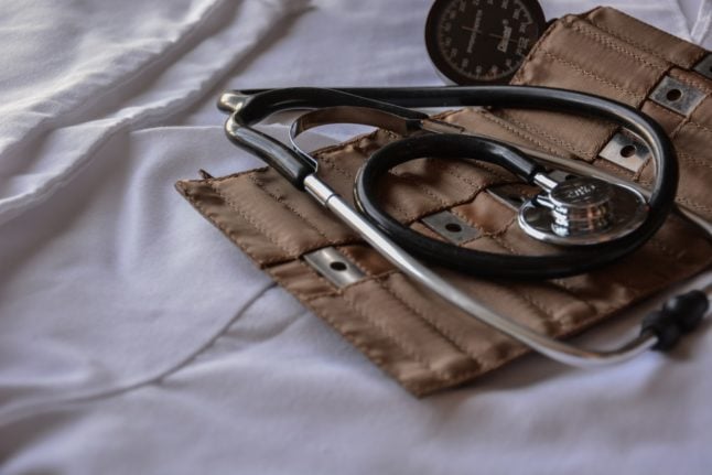 Pictured is a stethoscope.