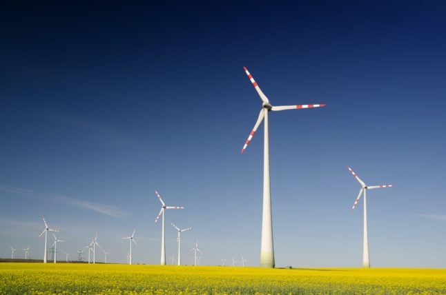 Wind turbines in the rape seed field in Austria