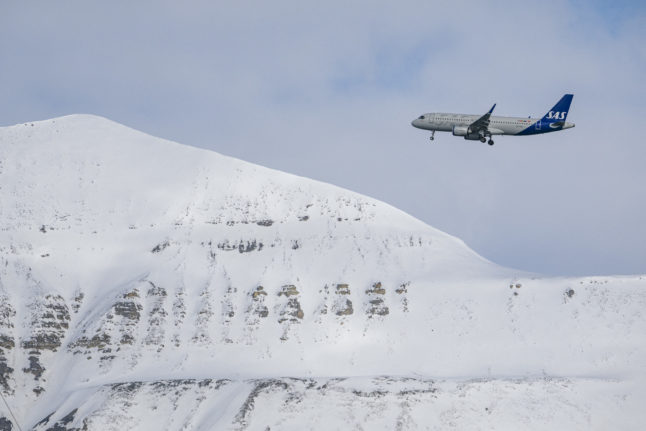 A SAS airplane prepares to land at Longyearbyen Airport in Norway's Svalbard archipelago