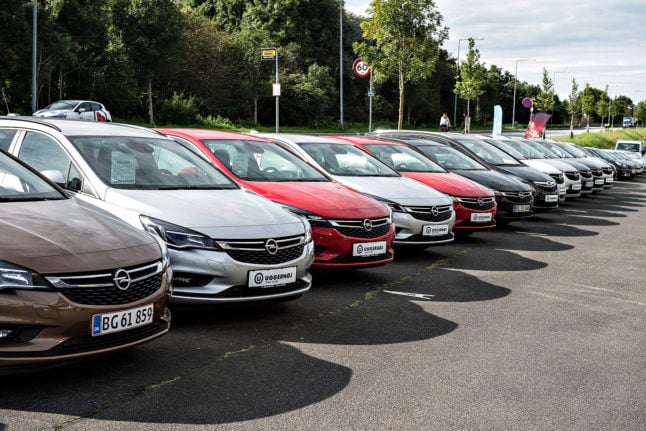 Cars parked on a dealership forecourt in Denmark.