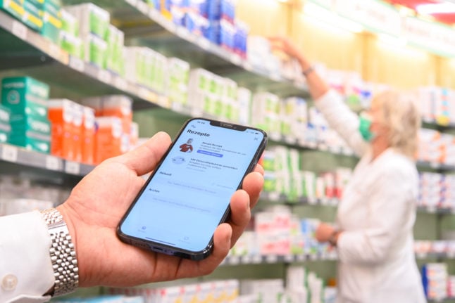 A person holds the e-Rezept app in a Lower Saxony pharmacy.