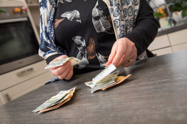 Pensioner counting money