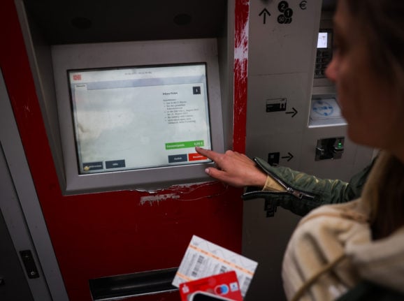A woman buys the €9 ticket in Hamburg on Wednesday.