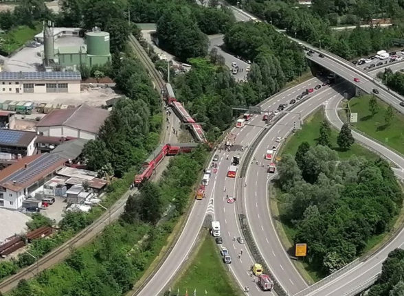 An aerial view shows the derailed train.