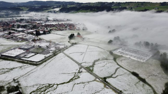 The landscape looks wintry on Sunday after a heavy hailstorm in Weiler im Allgäu