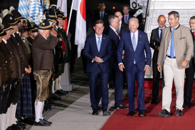 US President Joe Biden receives a traditional welcome as he walks with Bavarian premier Markus Söder ahead of the G7 summit on June 25th.