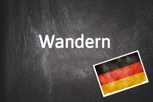 A blackboard with the word Wandern on it