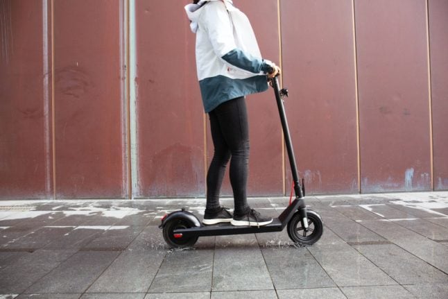 Somebody using an e-scooter.