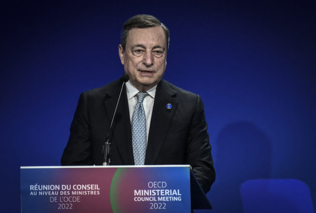 Italian Prime Minister Mario Draghi speaks during a ministerial meeting at the Organisation for Economic Co-operation and Development (OECD) at the OECD headquarters in Paris on June 9, 2022. 