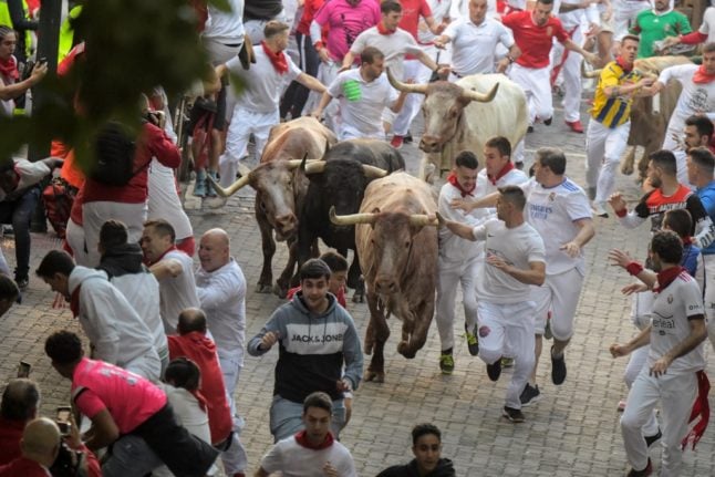 ‘It’s Christmas for adults’: The foreigners who flock to Spain’s bull-running fiesta