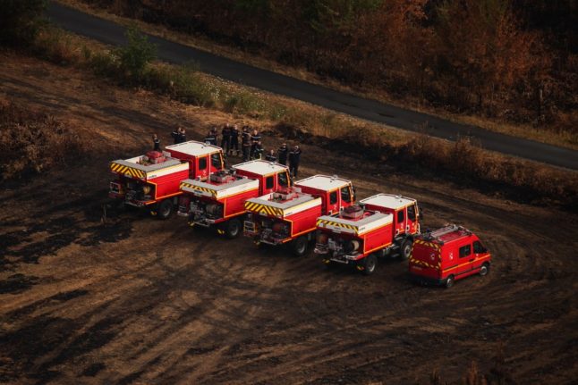 aerial view shows french firefighters monitoring wildfire situation in southwestern france