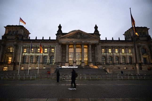 Germany's Reichstag building illuminated with 