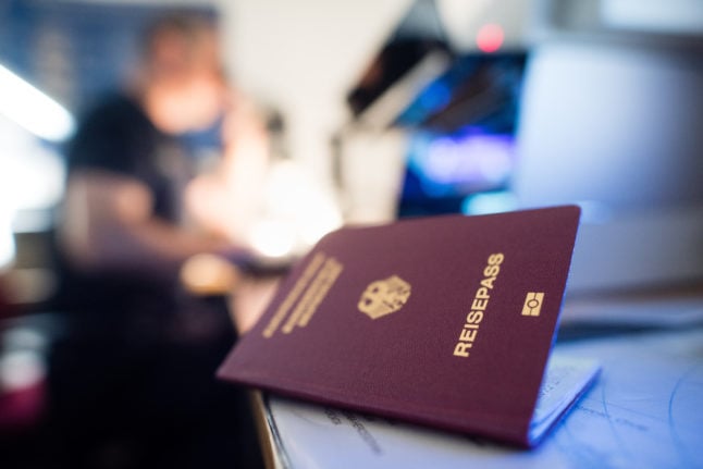 A German passport on a desk