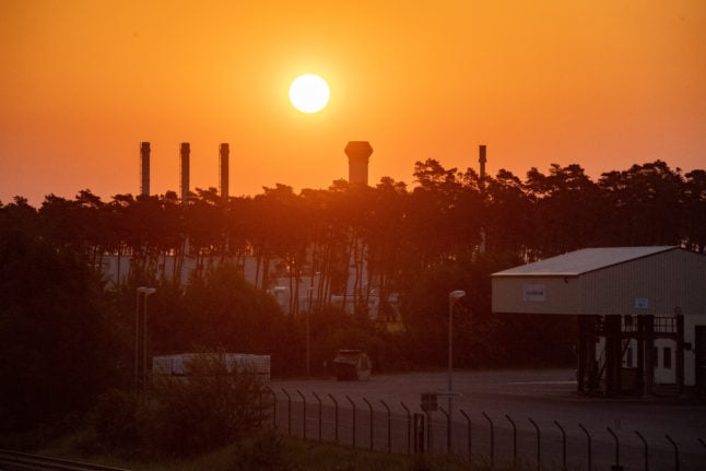 Sunrise over the gas receiving station of the Nord Stream 1 Baltic Sea pipeline and the transfer station of the OPAL long-distance gas pipeline in the industrial area of Lubmin.