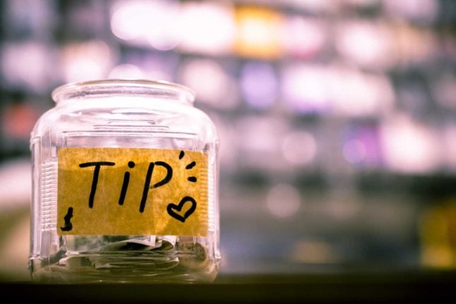 Do you tip in Switzerland? Photo by Sam Dan Truong on Unsplash
