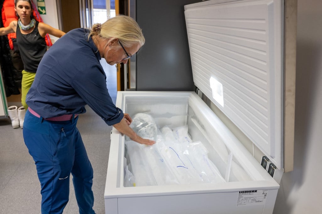 Glaciologist Andrea Fischer examines ice samples