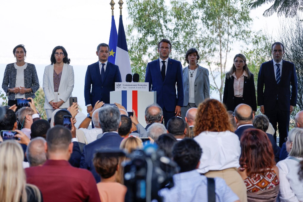 French President Emmanuel Macron (C), and his official delegation, (from L) French Sports Minister Amelie Oudea-Castera, French Culture Minister Rima Abdul-Malak, French Interior Minister Gerald Darmanin, French Foreign and European Affairs Minister Catherine Colonna, French Secretary of State for Veterans and Memory Patricia Miralles and French Armies Minister Sebastien Lecornu attend a meeting with members of the French community at the French ambassador to Algeria's residence, in Algiers