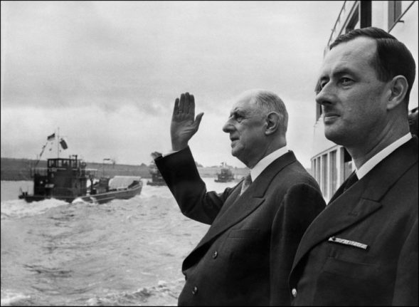 General de Gaulle with his son Philippe on a boat on the Rhine in Germany