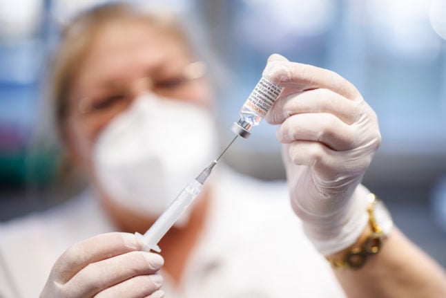 Nurse prepares dose of Pfizer Covid vaccine