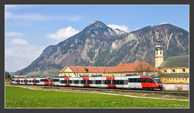 train passing mountains in austria
