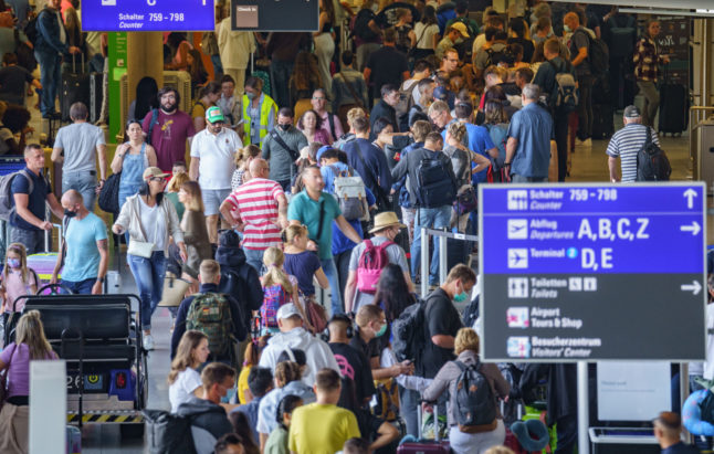 Lots of people in Frankfurt airport in July.