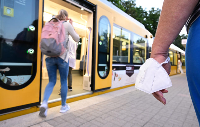 Passengers enter the U-Bahn train in Stuttgart