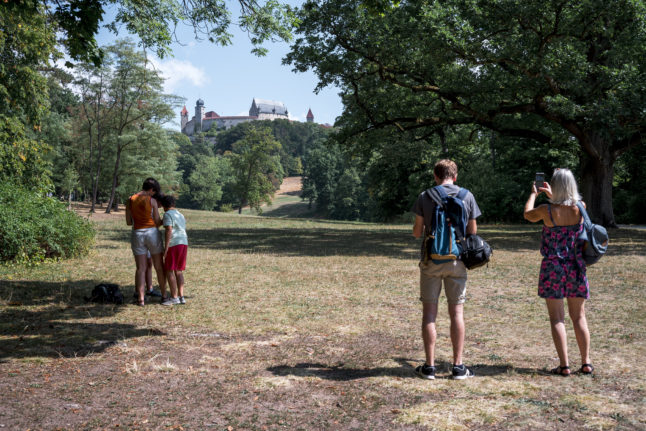 People photograph the Veste Coburg fortress on Sunday.