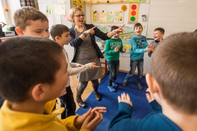 Young children learn German at a primary school in Bavaria. 