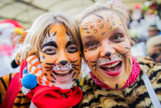 Revellers celebrate Karneval in Cologne in February 2018.