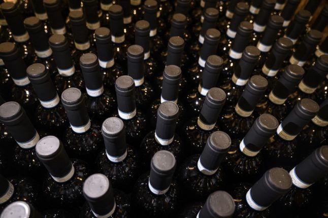 Bottles of red wine at Cagliero's Winery in Cuneo, Italy