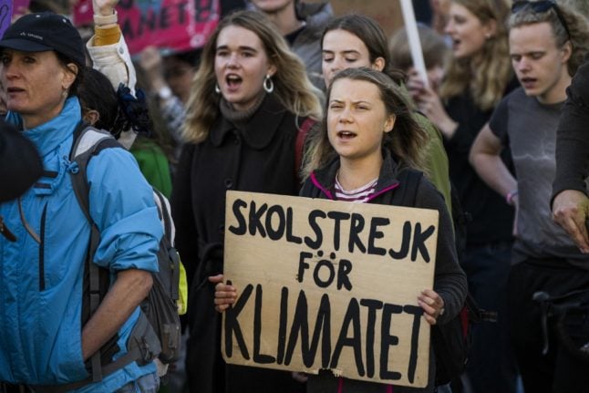 Swedish climate activist Greta Thunberg marches during a protest