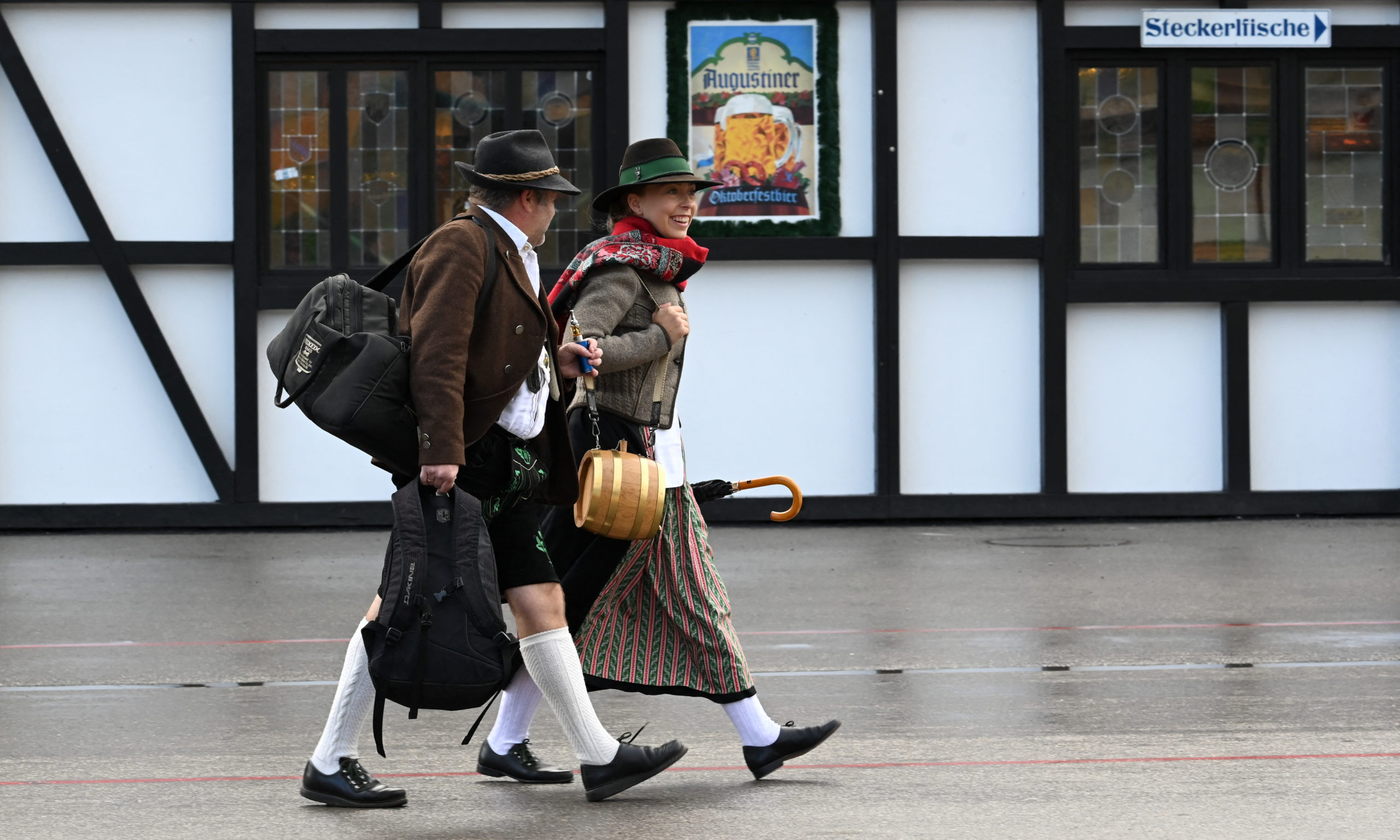 Man and woman in lederhosen at Oktoberfest