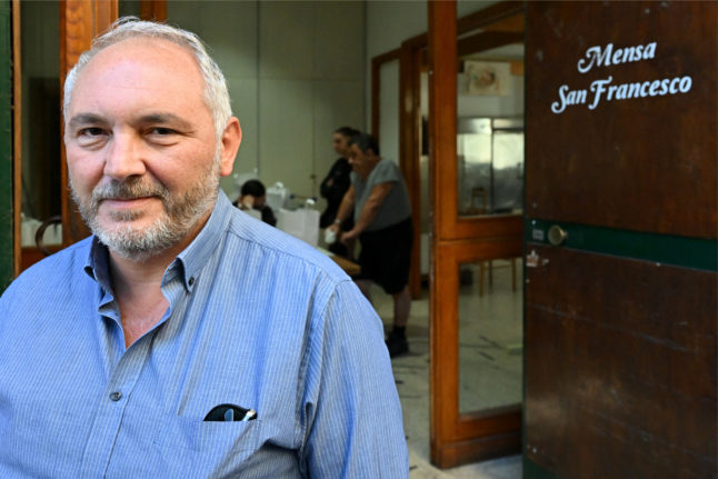 Rocco Papa, a spokesman for the Catholic Caritas charity which helps run Mario Conte's San Francesco soup kitchen, is pictured on September 20, 2022 in Salerno. Conte fears the 140 hot meals his Salerno soup kitchen dishes out daily will not be anywhere near enough, should Italy's poverty relief scheme be scrapped after Sunday's elections. 