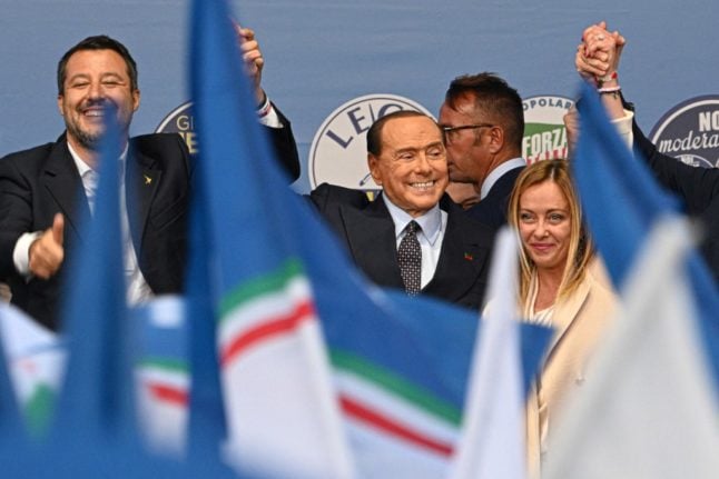 Matteo Salvini, Silvio Berlusconi and Giorgia Meloni at an election rally.