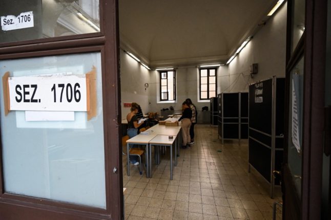 Volunteers prepare ballot papers in Rome