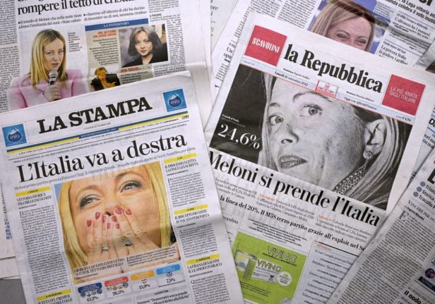 Front pages of Italian newspapers with photos of leader of Italian far-right party 