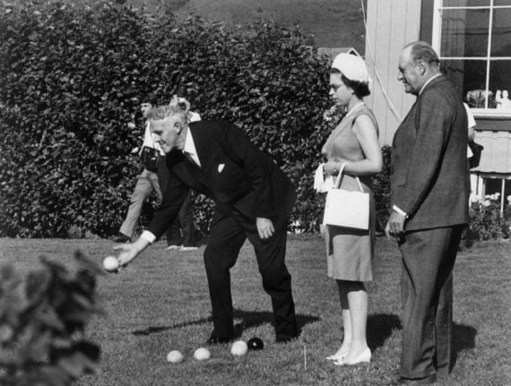 Pictured is the Queen Elizabeth II playing boules in Trondheim