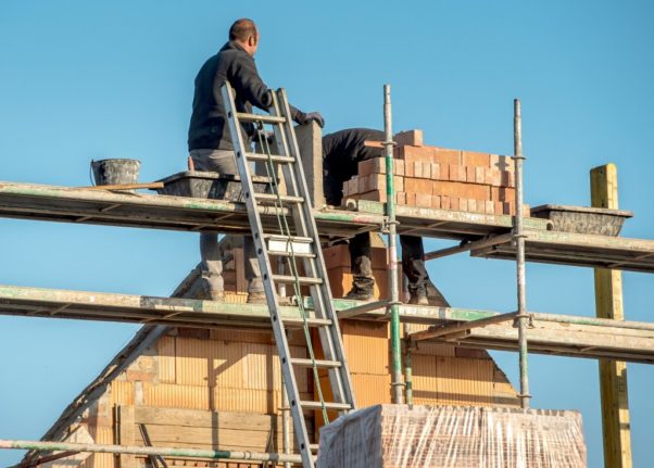 Workers on scaffolding in France.