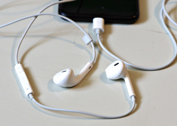 A photo of headphones plugged into an Iphone