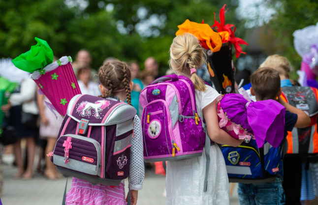 Children carry special bags for their first day of school in Germany.