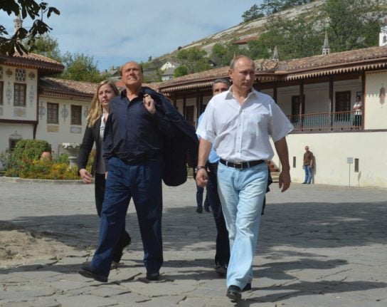 Russian President Vladimir Putin (R) and Italy's former Prime Minister Silvio Berlusconi (2nd L) visit the Bakhchisaray Historical and Cultural Preserve in Bakhchisaray outside Sevastopol, Crimea on September 12, 2015