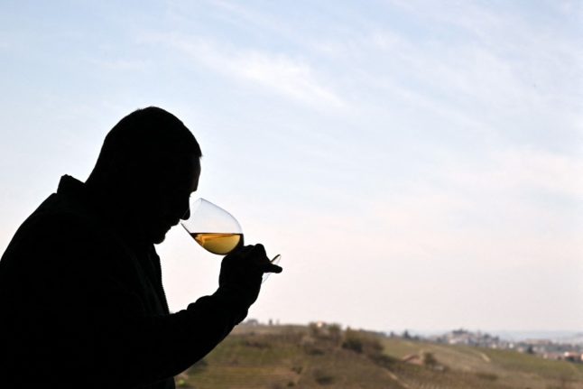 Man smelling a glass of Italian moscato.