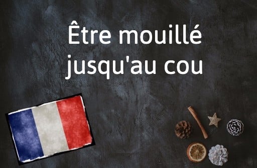 French Expression of the Day: Être mouillé jusqu’au cou
